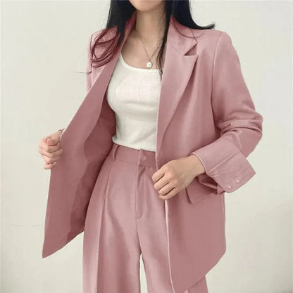 Kvinders Jakkesæt med Oversize Blazer og Højtaljede Bukser 1